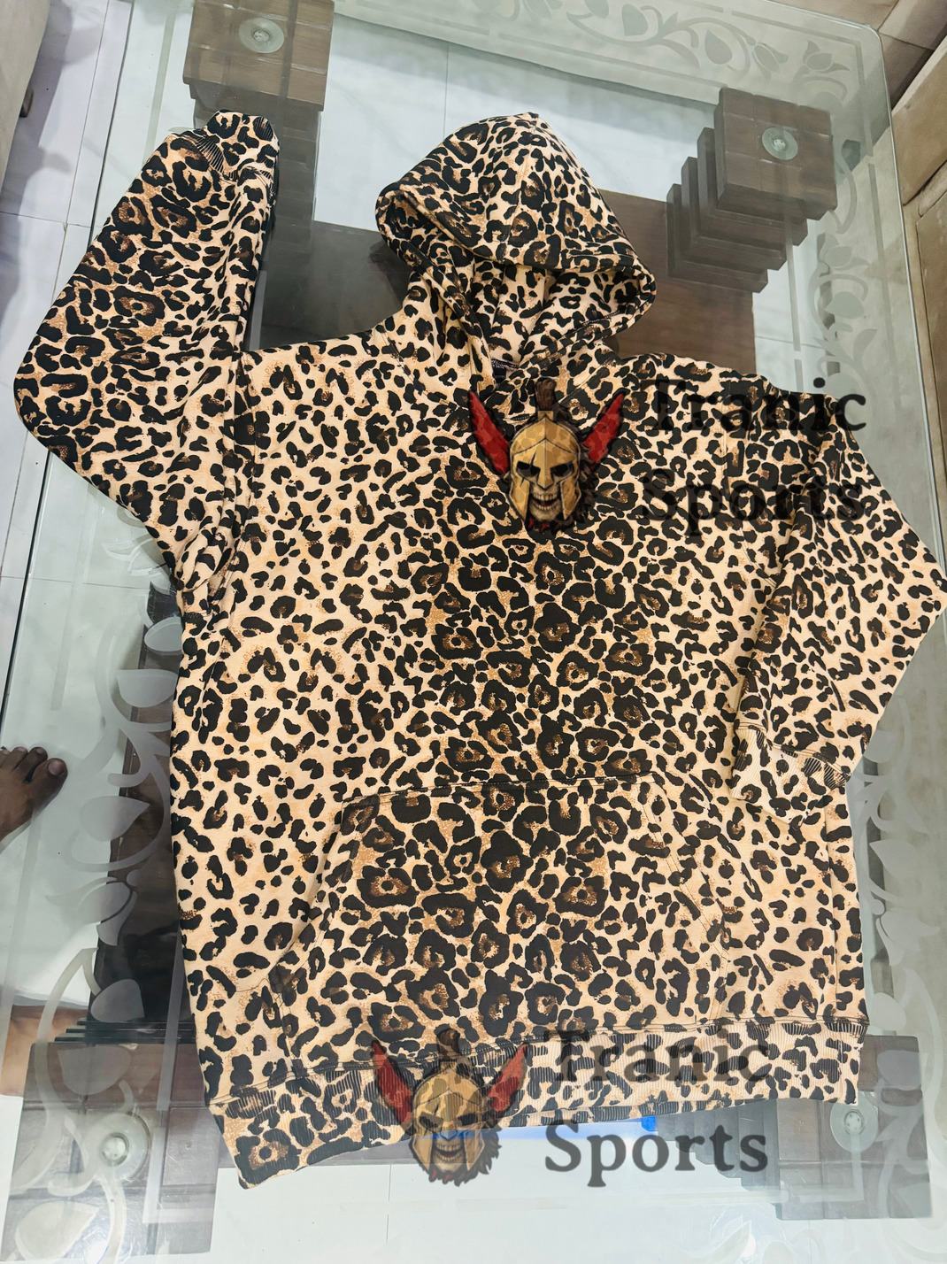 Leopard Print Hoodie with Spartan Skull Patch – Casual StreetwearLeopard Print Hoodie with Spartan Skull Patch – Casual Streetwear